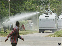 Police use water canons to disperse protesters