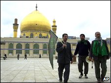 Pilgrims in front of the Askariya mosque in Samarra, one of Iraq's   holiest Shia sites